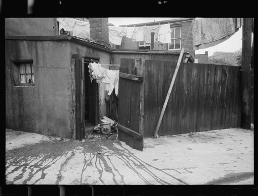 Alley dwelling near Union Station, showing crowded, tiny backyards, Washington, D.C.