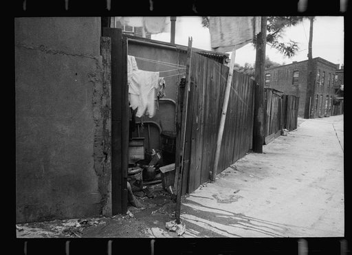 Alley dwelling near Union Station, showing overcrowded, tiny backyards, Washington, D.C.