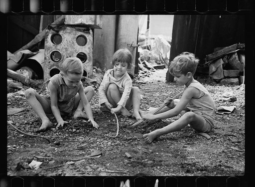 Untitled photo, possibly related to: Slum children at play, Washington, D.C. Children in their backyard near the Capitol. This area inhabited by both black and white