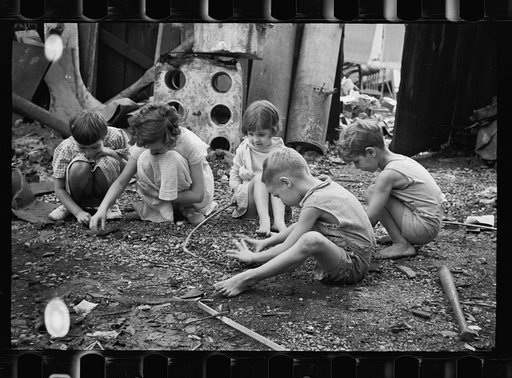 Untitled photo, possibly related to: Slum children at play, Washington, D.C. Children in their backyard near the Capitol. This area inhabited by both black and white