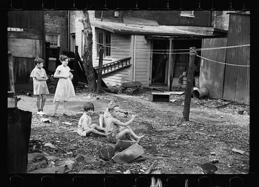 Untitled photo, possibly related to: Slum children at play, Washington, D.C. Children in their backyard near the Capitol. This area inhabited by both black and white