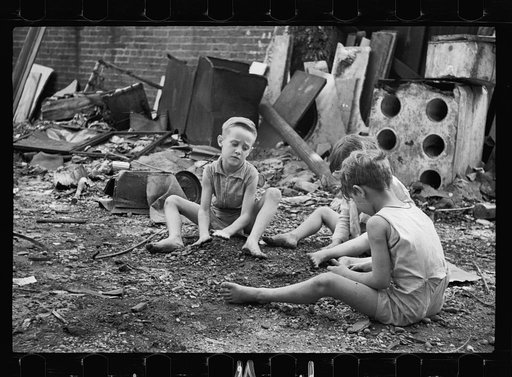 Untitled photo, possibly related to: Slum children at play, Washington, D.C. Children in their backyard near the Capitol. This area inhabited by both black and white