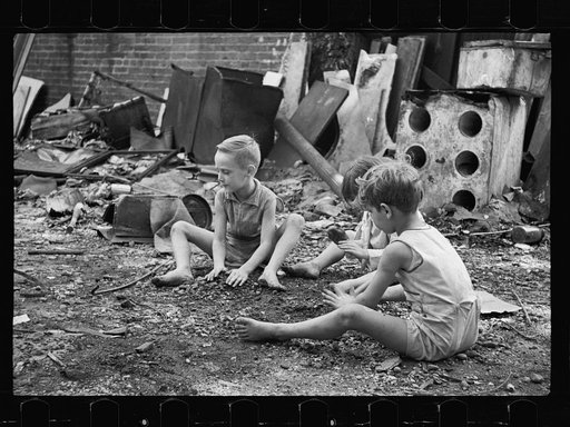 Untitled photo, possibly related to: Slum children at play, Washington, D.C. Children in their backyard near the Capitol. This area inhabited by both black and white