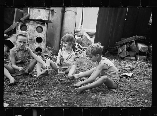 Untitled photo, possibly related to: Slum children at play, Washington, D.C. Children in their backyard near the Capitol. This area inhabited by both black and white