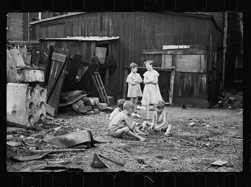 Untitled photo, possibly related to: Slum children at play, Washington, D.C. Children in their backyard near the Capitol. This area inhabited by both black and white