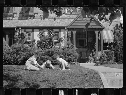Washington's healthy children. At play on the front lawn of one of Washington's better housing sections. These houses have both sweeping front lawns and clean backyards