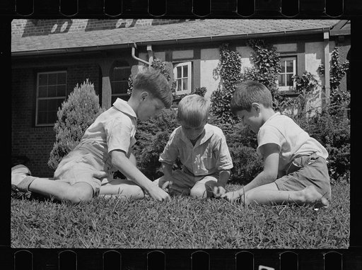 Untitled photo, possibly related to: Washington's healthy children. At play on the front lawn of one of Washington's better housing sections. These houses have both sweeping front lawns and clean backyards