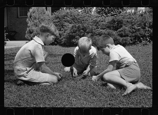Untitled photo, possibly related to: Washington's healthy children. At play on the front lawn of one of Washington's better housing sections. These houses have both sweeping front lawns and clean backyards