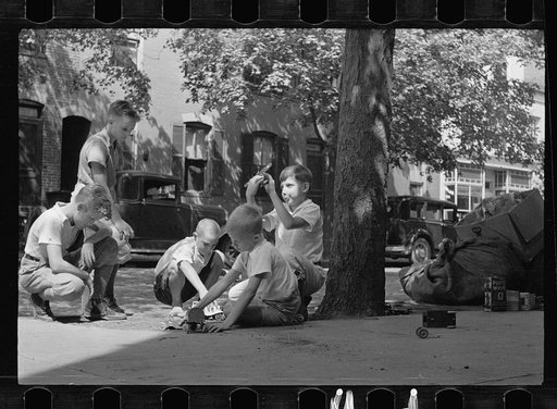 Untitled photo, possibly related to: Washington's healthy children. At play on the front lawn of one of Washington's better housing sections. These houses have both sweeping front lawns and clean backyards