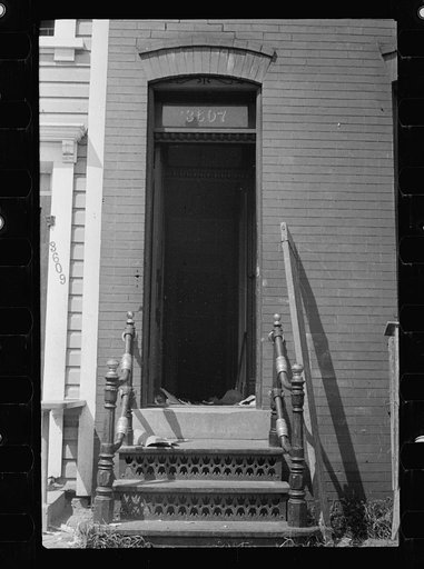 Untitled photo, possibly related to: Poor white hallway, Georgetown, D.C. Seldom do these people have even the desire to clear up rubbish, and the broom shown here seems to be out of place
