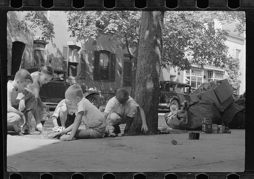 Untitled photo, possibly related to: Children playing on sidewalk, the only available playground. Georgetown, inhabited by both white and Negro, Washington, D.C.