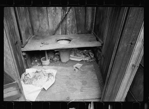 Untitled photo, possibly related to: Alleyway inhabited by black and white near the Capitol, Washington, D.C.