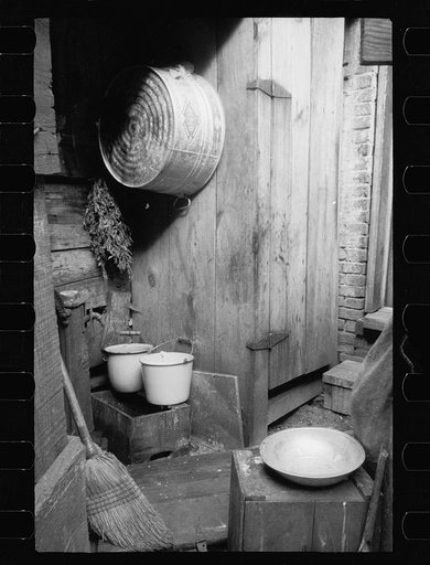 Untitled photo, possibly related to: Typical bedroom in Negro slum, Washington, D.C. A bed, one chair, and a possible bit of furniture for a bureau is usually the most such a bedroom can boast. Filth and vermin are as characteristic of this type of dwelling as the falling plaster shown here