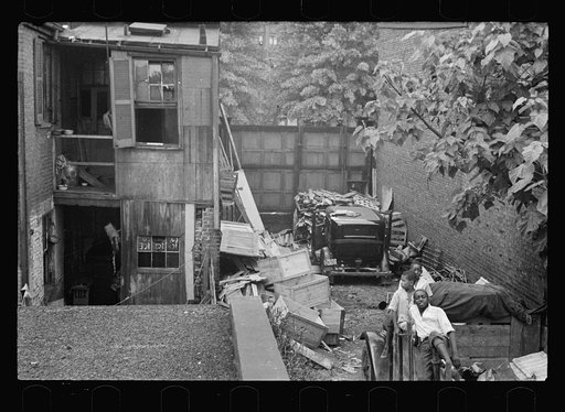 Untitled photo, possibly related to: Typical slum area. Note dome of Capitol, Washington, D.C.