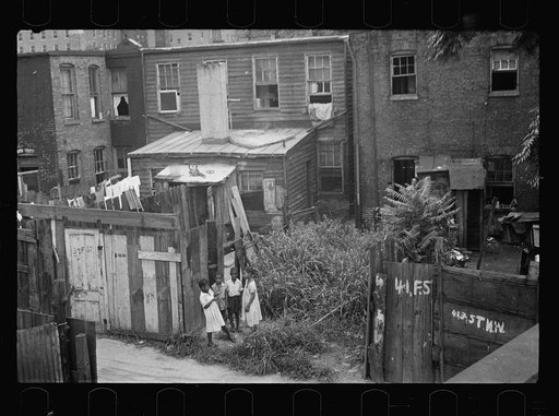 Untitled photo, possibly related to: Typical slum area. Note dome of Capitol, Washington, D.C.