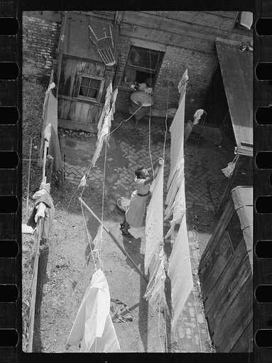 Untitled photo, possibly related to: Typical slum area. Note dome of Capitol, Washington, D.C.