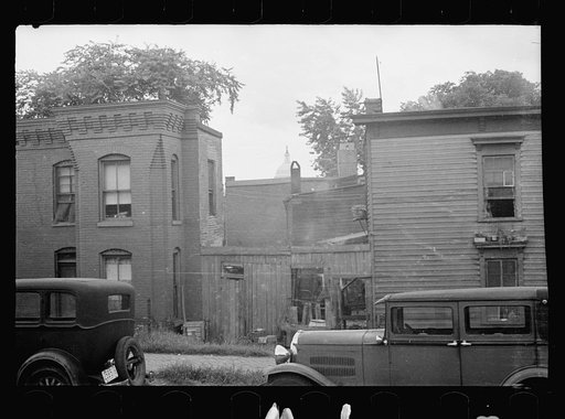 Untitled photo, possibly related to: A once proud section, Washington, D.C. These houses now are overcrowded with a Negro population and greatly in need of more sanitary methods