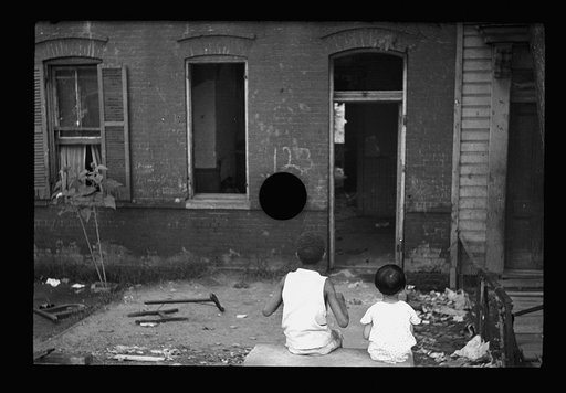 Untitled photo, possibly related to: Slum front yard playground, Washington, D.C. Such is the front yard available to these two youngsters to play in