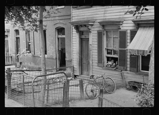 Untitled photo, possibly related to: Slum front yard playground, Washington, D.C. Such is the front yard available to these two youngsters to play in