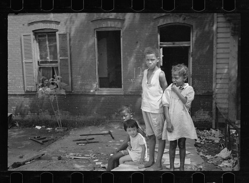 Untitled photo, possibly related to: Slum front yard playground, Washington, D.C. Such is the front yard available to these two youngsters to play in
