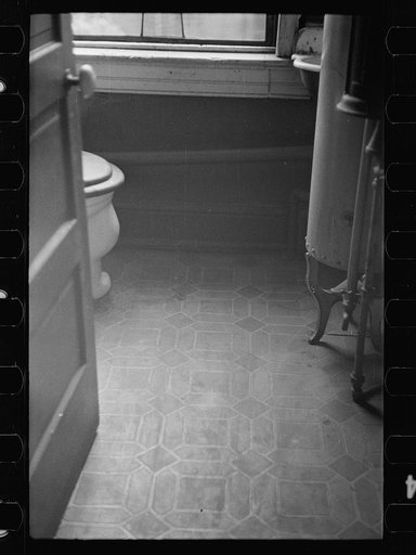 Untitled photo, possibly related to: Slum front yard playground, Washington, D.C. Such is the front yard available to these two youngsters to play in