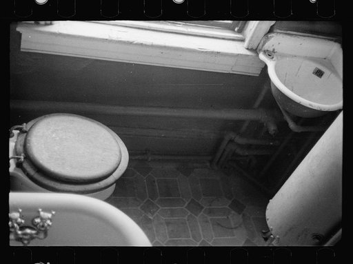 Untitled photo, possibly related to: Slum front yard playground, Washington, D.C. Such is the front yard available to these two youngsters to play in