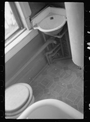 Untitled photo, possibly related to: Slum front yard playground, Washington, D.C. Such is the front yard available to these two youngsters to play in