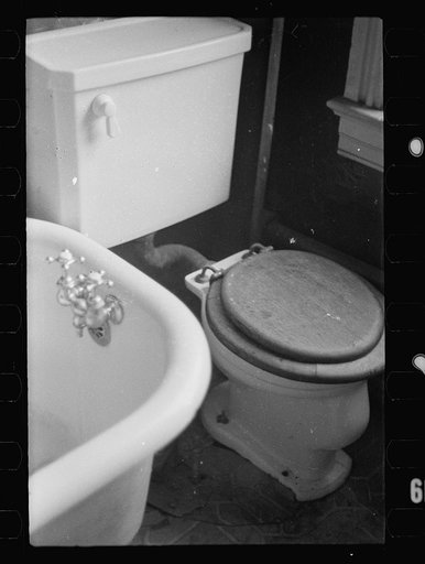 Untitled photo, possibly related to: Slum front yard playground, Washington, D.C. Such is the front yard available to these two youngsters to play in