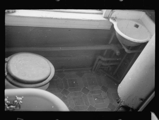 Untitled photo, possibly related to: Slum front yard playground, Washington, D.C. Such is the front yard available to these two youngsters to play in