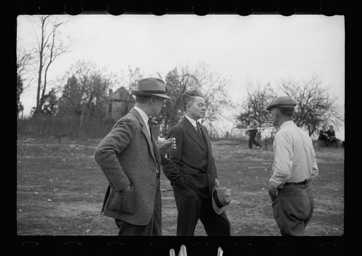 John Carter, Roy Stryker and Major Lewis of the Resettlement Administration at the Berwyn Project of Surburban Resettlement. Prince George's County, Maryland