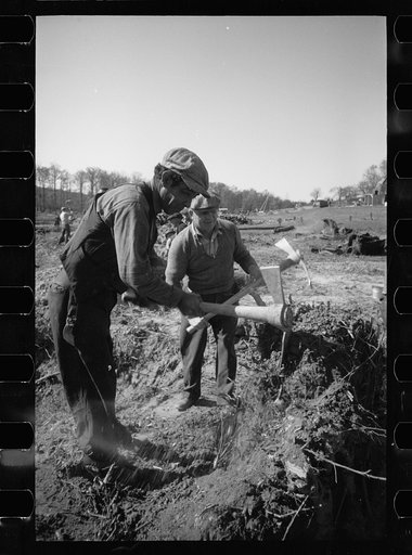Untitled photo, possibly related to: Transient worker clearing land, Prince George's County, Maryland