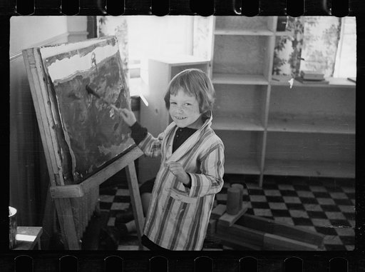Radburn, New Jersey, a privately financed model town which furnished some of the ideas for the United States Suburban Resettlement Administration's Greenbelt towns. Young artist at the community kindergarten