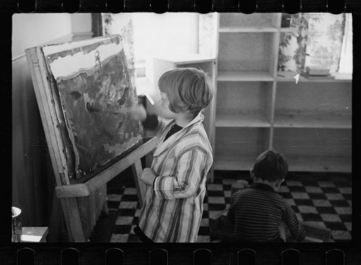 Untitled photo, possibly related to: Radburn, New Jersey, a privately financed model town which furnished some of the ideas for the United States Suburban Resettlement Administration's Greenbelt towns. Young artist at the community kindergarten