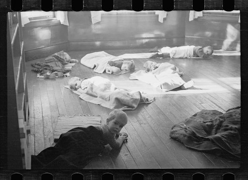 Untitled photo, possibly related to: Radburn, New Jersey, a privately financed model town which furnished some of the ideas for the United States Suburban Resettlement Administration's Greenbelt towns. Young artist at the community kindergarten