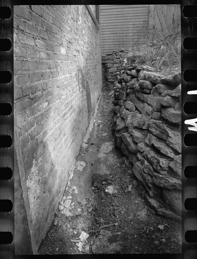 Open sewer back of a garage, Hamilton County, Ohio