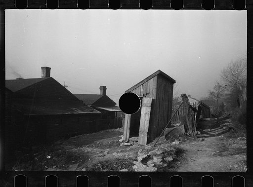 Untitled photo, possibly related to: Housing along front street, Hamilton, Ohio