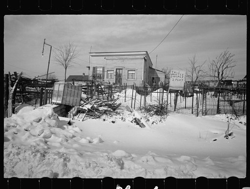 Untitled photo, possibly related to: Sign on farmhouse, bedspring fence, Franklin Township, West New Brunswick, New Jersey