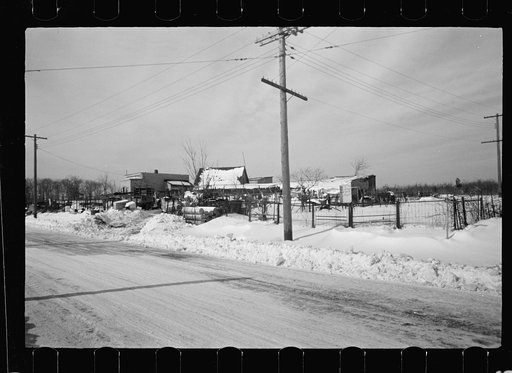 Untitled photo, possibly related to: Sign on farmhouse, bedspring fence, Franklin Township, West New Brunswick, New Jersey