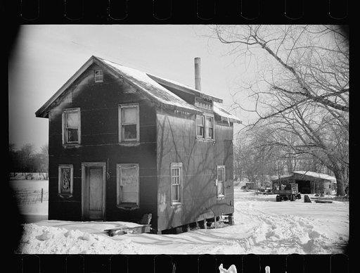 Untitled photo, possibly related to: Sign on farmhouse, bedspring fence, Franklin Township, West New Brunswick, New Jersey