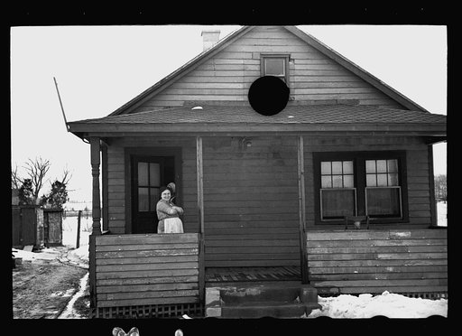 Untitled photo, possibly related to: Sign on farmhouse, bedspring fence, Franklin Township, West New Brunswick, New Jersey