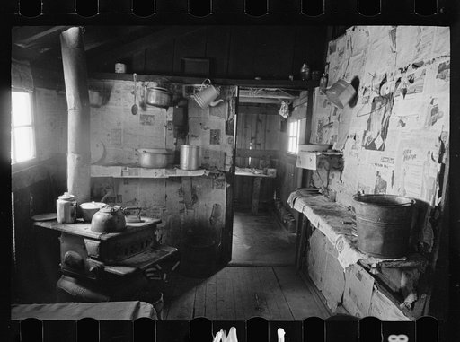 Untitled photo, possibly related to: Kitchen and washroom of two room mountain shack, Route U.S. 11, a few miles east of Marshall, North Carolina