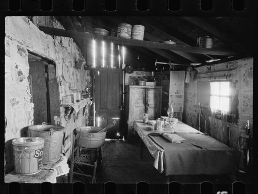 Kitchen and washroom of two room mountain shack, Route U.S. 11, a few miles east of Marshall, North Carolina