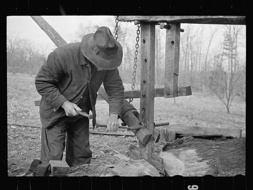 Demonstrating homemade cider press at Crabtree Recreational Demonstration Project near Raleigh, North Carolina