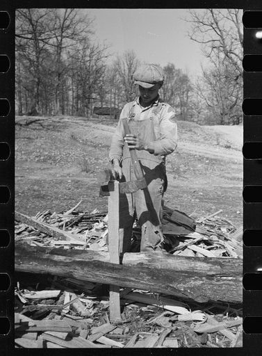 Splitting shingles with froe and maul on Coalins Project area farm, in western Kentucky