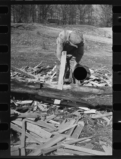 Untitled photo, possibly related to: Splitting shingles with froe and maul on Coalins Project area farm, in western Kentucky