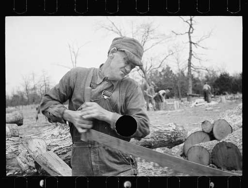 Untitled photo, possibly related to: Splitting shingles with froe and maul on Coalins Project area farm, in western Kentucky