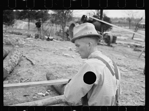 Untitled photo, possibly related to: Splitting shingles with froe and maul on Coalins Project area farm, in western Kentucky
