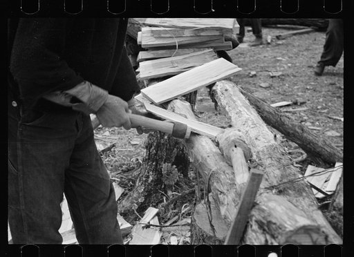 Splitting shingles with froe and maul on Wilson Cedar Forest, near Lebanon, Tennessee