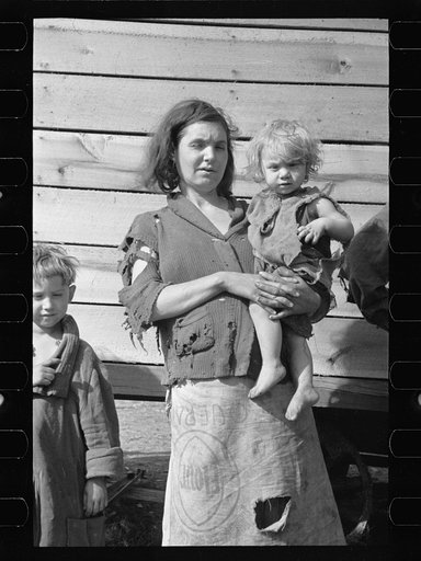 Mother and baby of family of nine living in field on U.S. Route 70 in Tennessee, near Tennessee River
