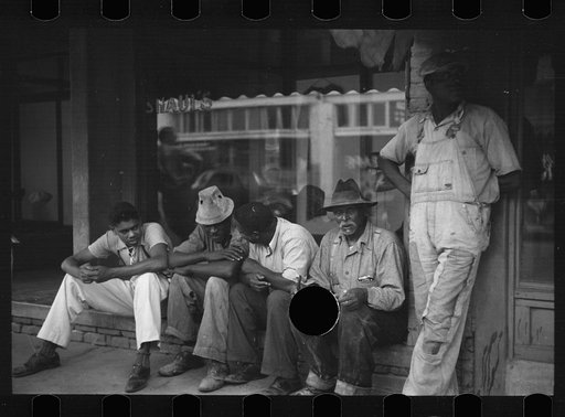 Untitled photo, possibly related to: Typical view of store and cotton trader in small Arkansas town. This one made in Marianna, Arkansas